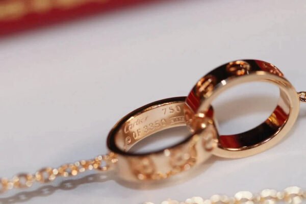 LOVE NECKLACE ROSE GOLD AND SILVER