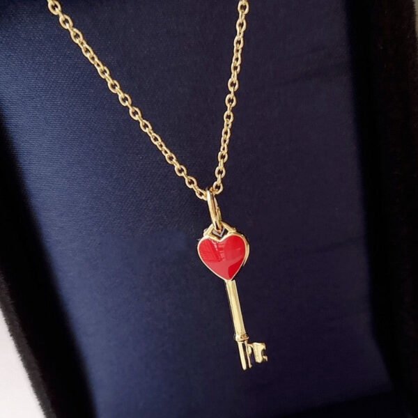 KEY PEDANT CARNELIAN HEART GOLD
