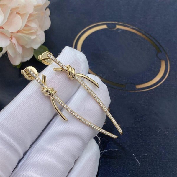 KNOT DROP EARRINGS IN GOLD WITH DIAMONDS