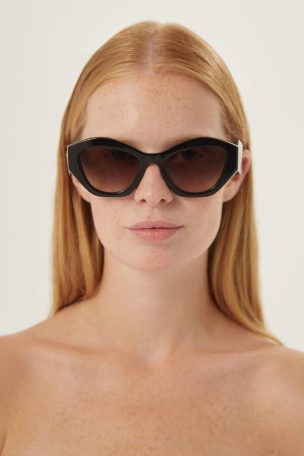 Prada oval black sunglasses featuring iconic logo - Lux Studios